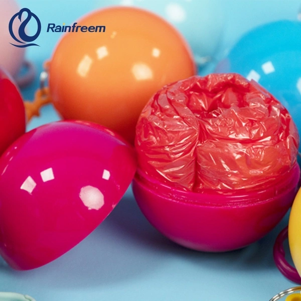 Portable Disposable Waterproof Compression Poncho Raincoat in Keychain Printed Pocket Balls for Adults Kids